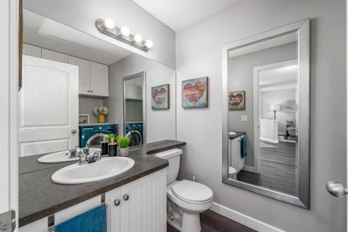 724 Luxstone Landing Sw, Airdrie, AB - Indoor Photo Showing Kitchen With Double Sink