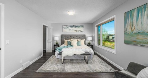 724 Luxstone Landing Sw, Airdrie, AB - Indoor Photo Showing Bedroom