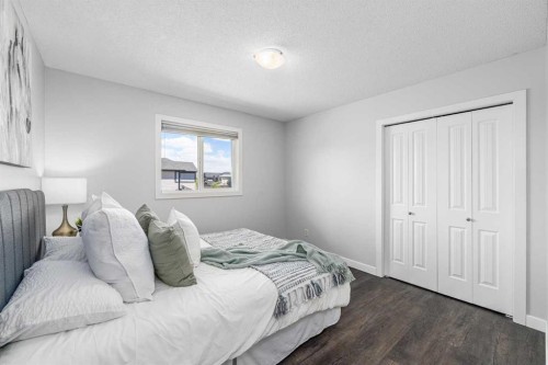 724 Luxstone Landing Sw, Airdrie, AB - Indoor Photo Showing Bedroom