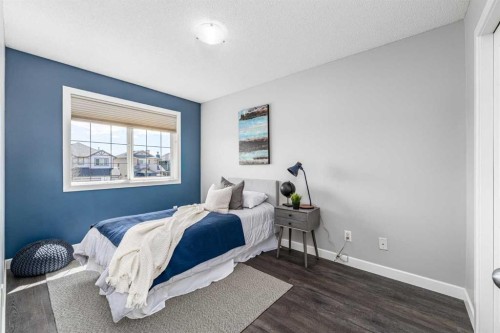 724 Luxstone Landing Sw, Airdrie, AB - Indoor Photo Showing Bedroom