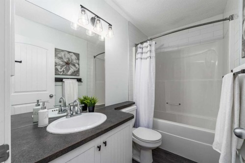 724 Luxstone Landing Sw, Airdrie, AB - Indoor Photo Showing Bedroom