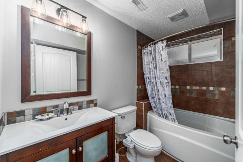 724 Luxstone Landing Sw, Airdrie, AB - Indoor Photo Showing Bedroom