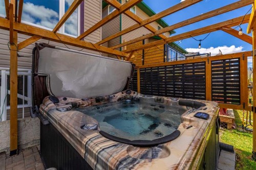 724 Luxstone Landing Sw, Airdrie, AB - Outdoor With Deck Patio Veranda
