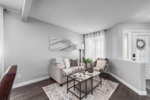 724 Luxstone Landing Sw, Airdrie, AB - Indoor Photo Showing Living Room