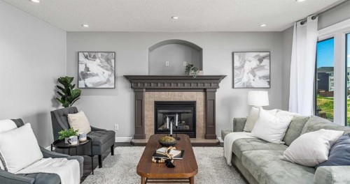 724 Luxstone Landing Sw, Airdrie, AB - Indoor Photo Showing Living Room With Fireplace
