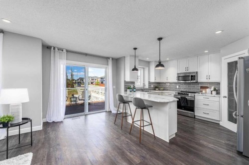 724 Luxstone Landing Sw, Airdrie, AB - Indoor Photo Showing Living Room