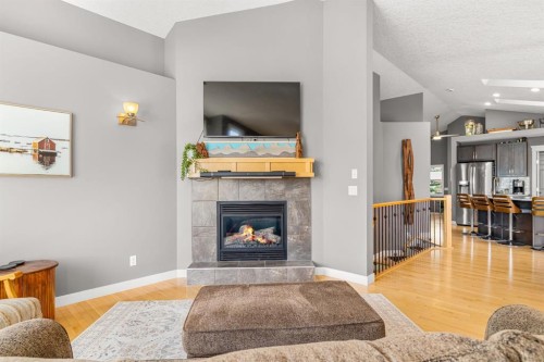 91 Evanspark Terrace Nw, Calgary, AB - Indoor Photo Showing Living Room With Fireplace