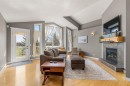 91 Evanspark Terrace Nw, Calgary, AB  - Indoor Photo Showing Living Room With Fireplace 