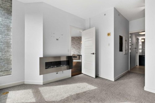 2010-225 11 Avenue Se, Calgary, AB - Indoor With Fireplace