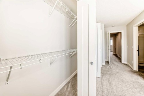 102 Tuscany Summit Square Nw, Calgary, AB - Indoor With Storage