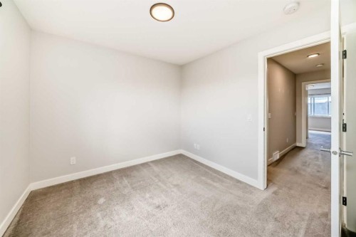 102 Tuscany Summit Square Nw, Calgary, AB - Indoor Photo Showing Other Room