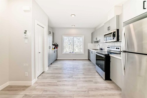 102 Tuscany Summit Square Nw, Calgary, AB - Indoor Photo Showing Kitchen With Stainless Steel Kitchen