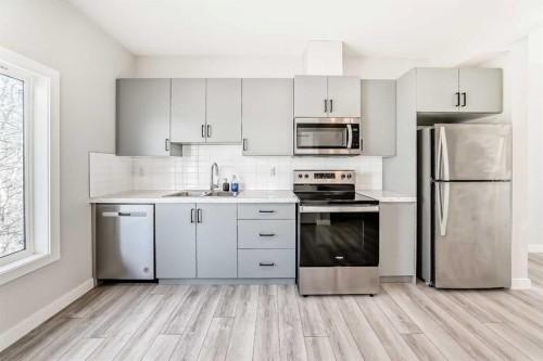 102 Tuscany Summit Square Nw, Calgary, AB - Indoor Photo Showing Kitchen With Stainless Steel Kitchen