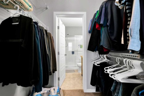 224-207 Sunset Drive, Cochrane, AB - Indoor With Storage
