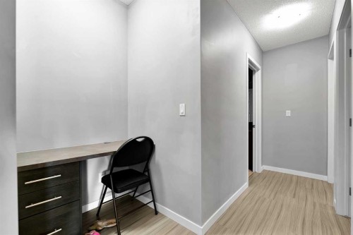 224-207 Sunset Drive, Cochrane, AB - Indoor Photo Showing Other Room