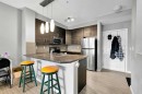 224-207 Sunset Drive, Cochrane, AB  - Indoor Photo Showing Kitchen With Double Sink 