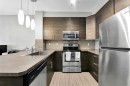 224-207 Sunset Drive, Cochrane, AB  - Indoor Photo Showing Kitchen 
