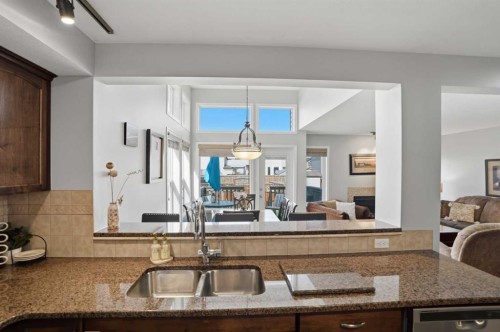 87 Bridlecrest Road Sw, Calgary, AB - Indoor Photo Showing Kitchen With Double Sink