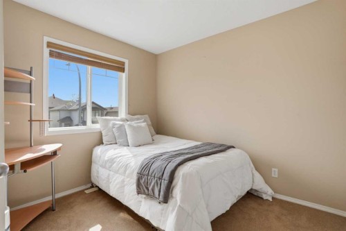 87 Bridlecrest Road Sw, Calgary, AB - Indoor Photo Showing Bedroom