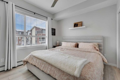 206-370 Harvest Hills Common Ne, Calgary, AB - Indoor Photo Showing Bedroom