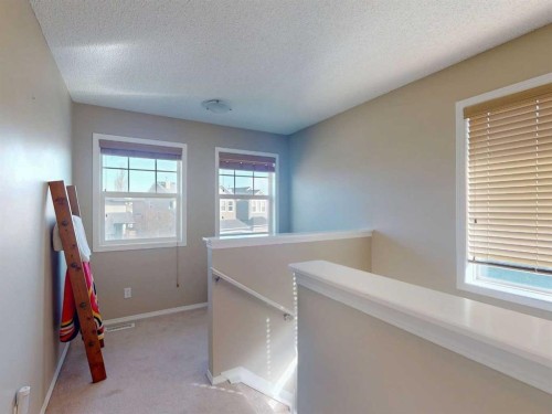 113 Evansford Circle Nw, Calgary, AB - Indoor Photo Showing Other Room