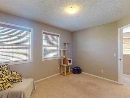 113 Evansford Circle Nw, Calgary, AB - Indoor Photo Showing Bedroom