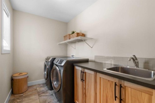 134 Masters Point Se, Calgary, AB - Indoor Photo Showing Laundry Room