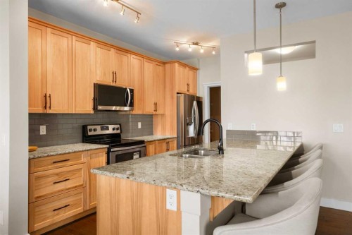 134 Masters Point Se, Calgary, AB - Indoor Photo Showing Kitchen With Stainless Steel Kitchen With Double Sink With Upgraded Kitchen