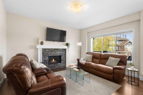 134 Masters Point Se, Calgary, AB - Indoor Photo Showing Living Room With Fireplace