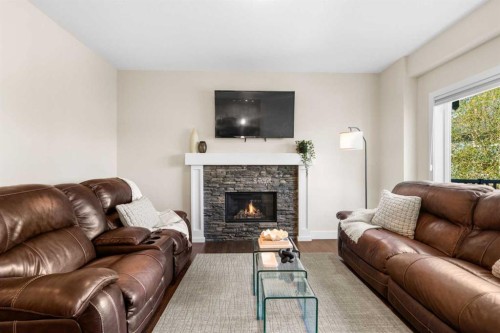 134 Masters Point Se, Calgary, AB - Indoor Photo Showing Living Room With Fireplace