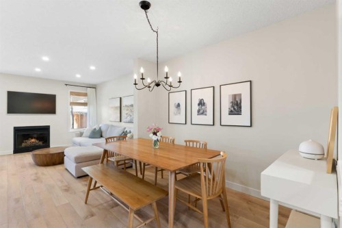 89 Tuscany Springs Heights Nw, Calgary, AB - Indoor With Fireplace