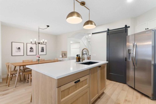 89 Tuscany Springs Heights Nw, Calgary, AB - Indoor Photo Showing Kitchen With Double Sink With Upgraded Kitchen