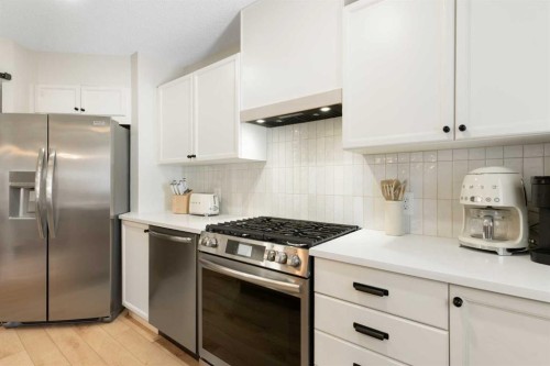 89 Tuscany Springs Heights Nw, Calgary, AB - Indoor Photo Showing Kitchen With Upgraded Kitchen