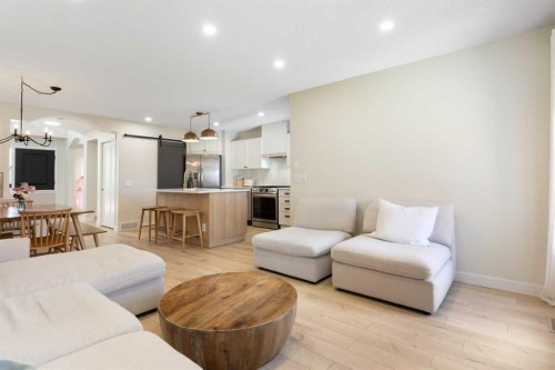 89 Tuscany Springs Heights Nw, Calgary, AB - Indoor Photo Showing Living Room