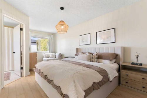 89 Tuscany Springs Heights Nw, Calgary, AB - Indoor Photo Showing Bedroom