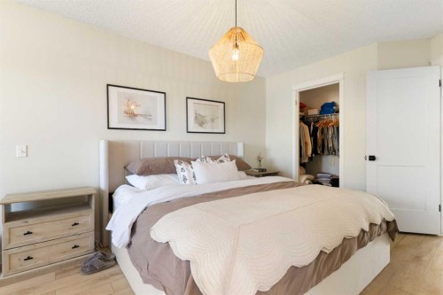 89 Tuscany Springs Heights Nw, Calgary, AB - Indoor Photo Showing Bedroom