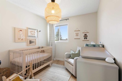 89 Tuscany Springs Heights Nw, Calgary, AB - Indoor Photo Showing Bedroom
