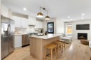 89 Tuscany Springs Heights Nw, Calgary, AB  - Indoor Photo Showing Kitchen With Fireplace With Upgraded Kitchen 