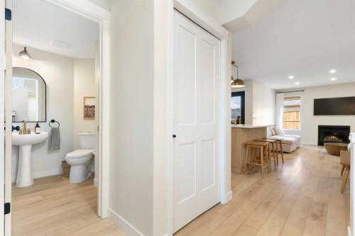 89 Tuscany Springs Heights Nw, Calgary, AB - Indoor With Fireplace