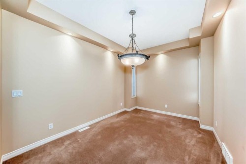 22 Everhollow Rise Sw, Calgary, AB - Indoor Photo Showing Other Room