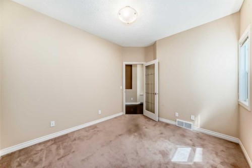 22 Everhollow Rise Sw, Calgary, AB - Indoor Photo Showing Other Room