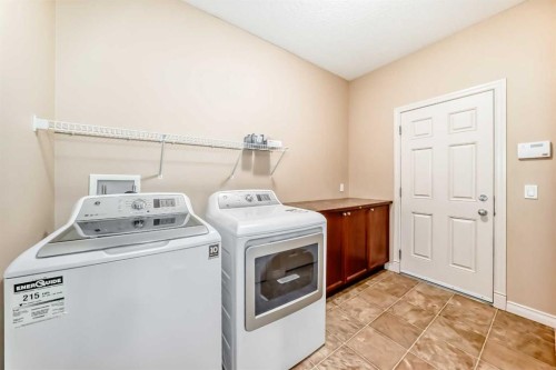 22 Everhollow Rise Sw, Calgary, AB - Indoor Photo Showing Laundry Room