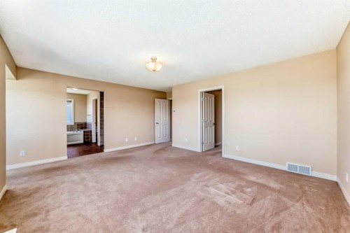 22 Everhollow Rise Sw, Calgary, AB - Indoor Photo Showing Other Room