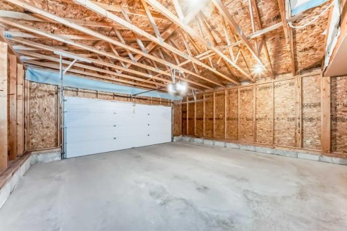 22 Everhollow Rise Sw, Calgary, AB - Indoor Photo Showing Garage