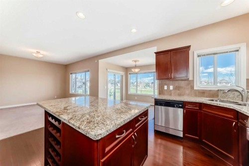 22 Everhollow Rise Sw, Calgary, AB - Indoor Photo Showing Kitchen With Double Sink