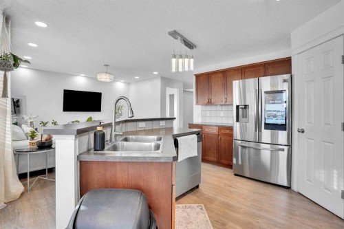 73 Covebrook Place Ne, Calgary, AB - Indoor Photo Showing Kitchen With Stainless Steel Kitchen With Double Sink