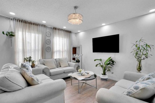 73 Covebrook Place Ne, Calgary, AB - Indoor Photo Showing Living Room