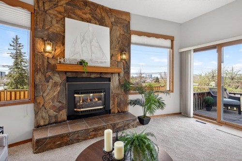 59 Fairview Drive Se, Calgary, AB - Indoor Photo Showing Living Room With Fireplace