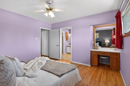 59 Fairview Drive Se, Calgary, AB - Indoor Photo Showing Bedroom