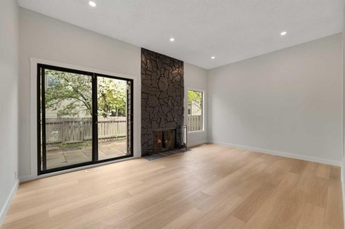 32-99 Midpark Gardens Se, Calgary, AB - Indoor With Fireplace